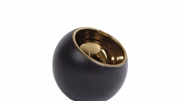Deze theelichthouder Pia S goud/zwart. Deze theelichthouder  Pia zal jouw interieur een echte boost geven.